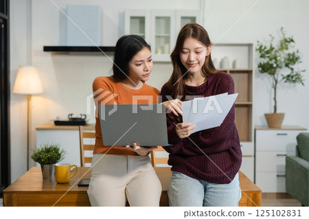 Happy two woman working online from home, lifestyle and small business. 125102831