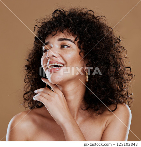 Skincare, cosmetics and woman with wellness, natural beauty and face detox for smooth skin against brown studio background. Makeup, healthy girl and female with smile, confidence and organic facial. 125102848