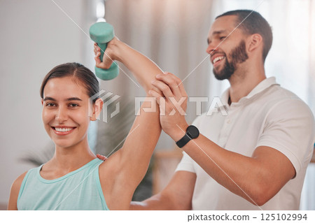 Health, physiotherapy and wellness exercise rehabilitation with happy woman client lifting dumbbell. Workout, healthcare and physiotherapist helping girl with arm stretching and recovery fitness. 125102994