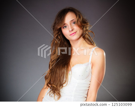 Cute young woman in lingerie. 125103099