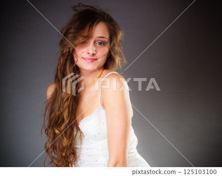 Cute young woman in lingerie. 125103100