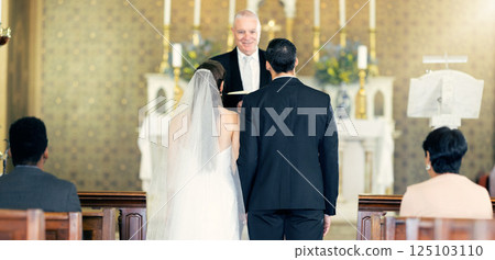 Couple, wedding and priest with commitment, love and marriage ceremony in church service together. Man, woman and pastor with trust, celebration and christian marry event in a chapel or spiritual 125103110