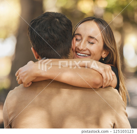 Hug, love and couple on a date in a park with a smile, happy and romantic in nature. Care, happiness and man and woman hugging for affection, missing and in marriage together in a forest in summer Hug, love and couple on a date in a park with a smile, happy and romantic in nature. Care, happiness and man and woman hugging for affection, missing and in marriage together in a forest in summer 125103123
