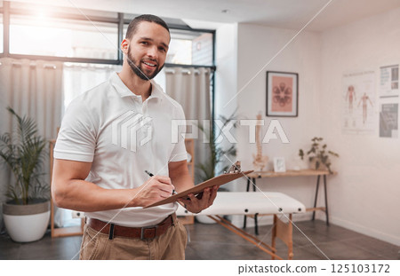 Wellness, health and happy physiotherapy portrait in professional workspace with notes clipboard. Rehabilitation, reflexology and expert therapy man in office for body trauma evaluation. 125103172