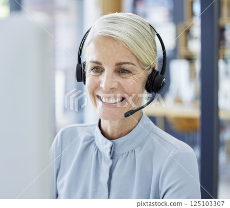 Telemarketing worker, office and consultant at desk for crm, contact us or customer service company. Mature woman, business networking or call center sale consulting for insurance telecom on comouter 125103307