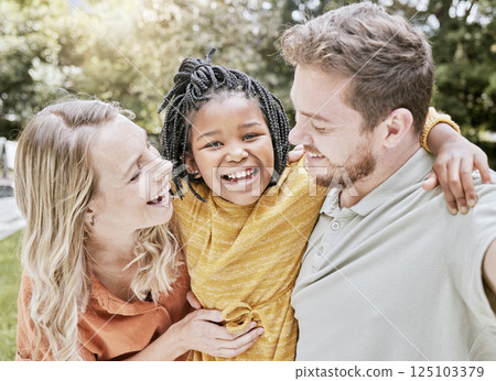 Happy family, parents and adoption kid at park, garden and nature for fun, bonding and quality time with love, care and happiness together. Smile black kid hug foster mom, dad and diversity people Happy family, parents and adoption kid at park, garden and nature for fun, bonding and quality time with love, care and happiness together. Smile black kid hug foster mom, dad and diversity people 125103379