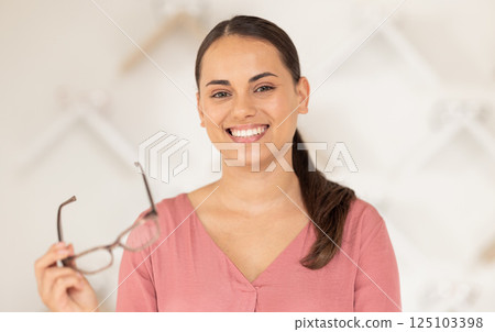Woman, fashion glasses and vision for eyes in optometry clinic, ophthalmology store and eye care retail shop. Portrait, smile and happy customer with lens prescription, insurance and glaucoma support 125103398