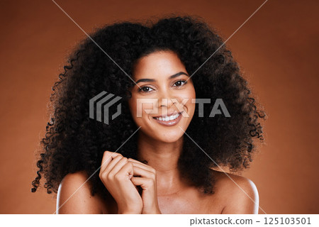 Hair care, natural and black woman in portrait for salon, beauty and wellness with healthy glow in studio. Skincare, hair growth results and happy young model in headshot or face for self love luxury 125103501