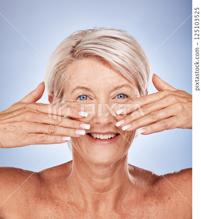 Skincare, manicure and portrait senior woman with a wellness, health and beauty skin routine in a studio. Cosmetics, anti aging and elderly lady with facial treatment for wrinkles by gray background. 125103525