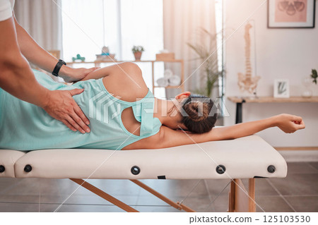 Spa, wellness and physiotherapy, massage and muscle relax with woman and physiotherapist for health and physio. Body care, chiropractor and back massage at clinic with healthy physical therapy. 125103530
