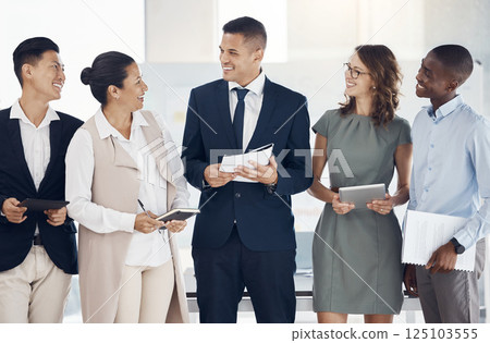 Leadership, teamwork and group of business people in office for workshop with tablet and books. Diversity, collaboration and happy employees in workplace having discussion, talking or conversation. 125103555
