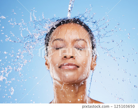 Beauty, water and splash with black woman and shower for hydration, moisture and spa luxury. Natural, fresh and hygiene with face of girl model and water drop for skincare, relax and self care Beauty, water and splash with black woman and shower for hydration, moisture and spa luxury. Natural, fresh and hygiene with face of girl model and water drop for skincare, relax and self care 125103650