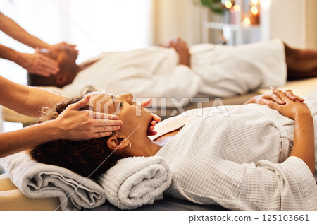 Couple, massage and spa wellness for headache and stress to feel zen with beauty and skin care. Relax hands on black couple sleeping client with facial, skincare healing and luxury face treatment Couple, massage and spa wellness for headache and stress to feel zen with beauty and skin care. Relax hands on black couple sleeping client with facial, skincare healing and luxury face treatment 125103661