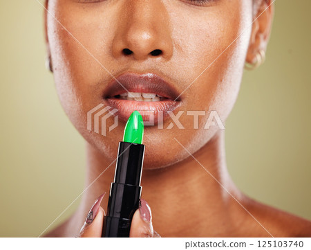 Black woman, lipstick and mouth makeup, cosmetics and zoom in of lips, skincare and beauty in studio background. Advertising, skin or female model with lip gloss, makeup cosmetic and color product 125103740