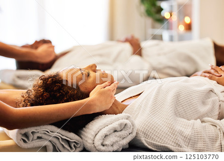 Head massage, couple and spa for zen and relax massage from a massage therapist in a beauty spa. Facial massage, break and calm man and woman with masseuse for stress relief and treatment. 125103770