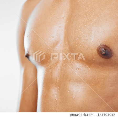Strong man, wet chest and human body, nipples and skin of naked bodybuilder, model and muscle. Closeup water drops on torso of fitness athlete guy with power, six pack abs and sweating water droplets 125103932