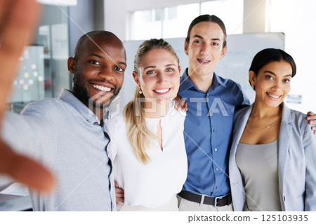 Selfie, friends and team with a business man and woman group taking a photograph together in their office. Portrait, teamwork and diversity with male and female colleagues taking a picture at work 125103935