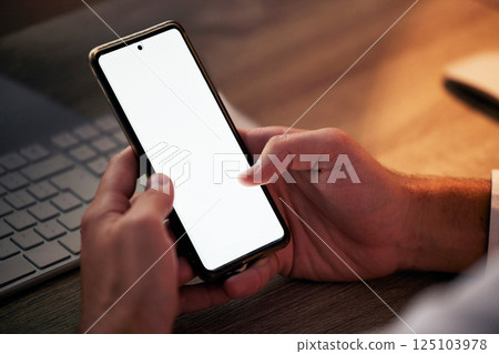 Hands, phone and mock up in night office for marketing or advertising. Mockup space, tech and man networking on 5g mobile, social media or texting online, checking email or scrolling on smartphone. Hands, phone and mock up in night office for marketing or advertising. Mockup space, tech and man networking on 5g mobile, social media or texting online, checking email or scrolling on smartphone. 125103978