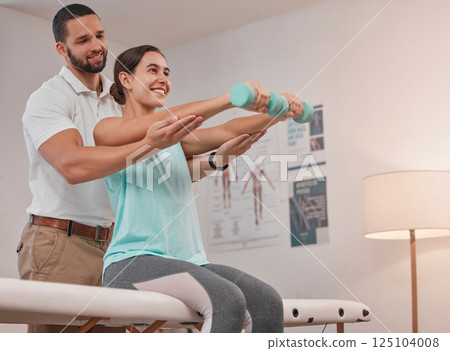 Physical therapy, dumbbell and physiotherapist helping woman for muscle, fitness and body healthcare rehabilitation. Physiotherapy, patient and chiropractor support with stretching for sports injury Physical therapy, dumbbell and physiotherapist helping woman for muscle, fitness and body healthcare rehabilitation. Physiotherapy, patient and chiropractor support with stretching for sports injury 125104008