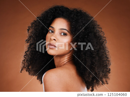 Model, black woman and afro hair with beauty, makeup and wellness in aesthetic portrait for cosmetic self care. Woman, hair care and cosmetics face with natural curly hair against studio background Model, black woman and afro hair with beauty, makeup and wellness in aesthetic portrait for cosmetic self care. Woman, hair care and cosmetics face with natural curly hair against studio background 125104060