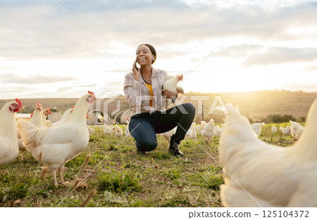 Black woman, phone call and countryside on chicken farm with smile for live stock in the outdoors. Happy African American female farmer smiling on phone for sustainability, agriculture and animals Black woman, phone call and countryside on chicken farm with smile for live stock in the outdoors. Happy African American female farmer smiling on phone for sustainability, agriculture and animals 125104372
