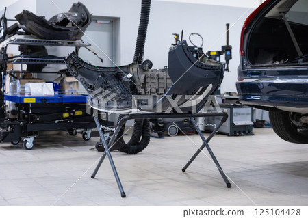 Auto service handling car repair 125104428