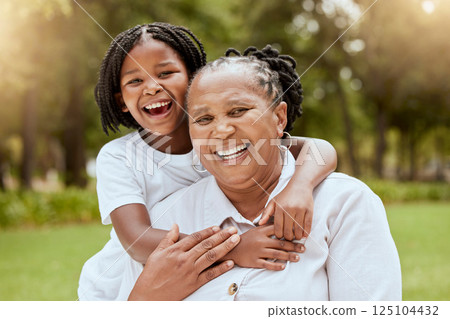 Happy grandmother in garden park with girl, portrait of young child on mothers day and growth in sunshine. Summer outdoor adventure together in forest field, natural family smile and green nature Happy grandmother in garden park with girl, portrait of young child on mothers day and growth in sunshine. Summer outdoor adventure together in forest field, natural family smile and green nature 125104432