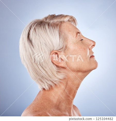 Senior woman, profile and facial skincare for natural beauty or luxury cosmetics makeup. Elderly model, face dermatology wellness and healthy body lifestyle or collagen therapy in grey background. 125104482