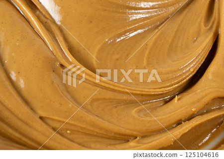 Abstract Close-Up of Peanut Butter Texture 125104616