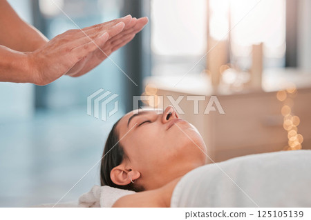 Hands, relax woman or reiki spa for headache pain relief, depression healing or stress management in healthcare wellness or holistic clinic. Man, energy healer or mind chakra aura cleanse on patient 125105139