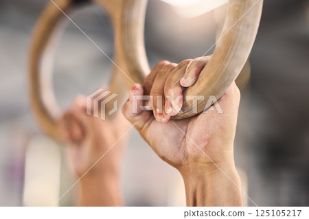Gym, hands and rings workout by man for fitness, muscle and training closeup with mockup. Hand, exercise and gym ring pull up by athlete guy cross, energy and endurance challenge, performance and fit Gym, hands and rings workout by man for fitness, muscle and training closeup with mockup. Hand, exercise and gym ring pull up by athlete guy cross, energy and endurance challenge, performance and fit 125105217