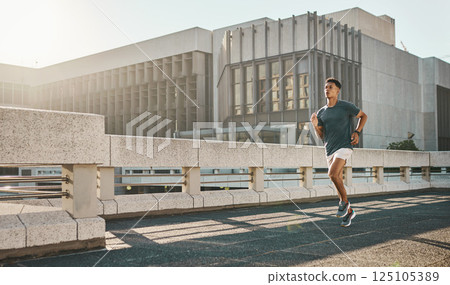 Man, running or city street or road fitness for cardio exercise, wellness training or marathon workout. Runner, sports athlete or personal trainer and running shoes, speed energy or health motivation Man, running or city street or road fitness for cardio exercise, wellness training or marathon workout. Runner, sports athlete or personal trainer and running shoes, speed energy or health motivation 125105389