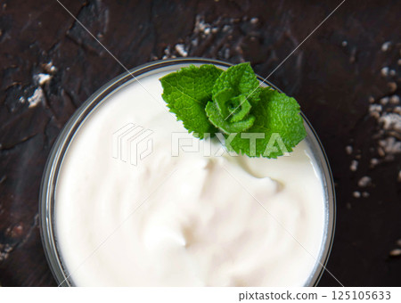 Homemade yogurt or sour cream in a bowl 125105633