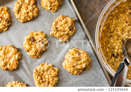 Healthy homemade oatmeal cookies dough before baking. Ready to Bake Healthy homemade oatmeal cookies dough before baking. Ready to Bake 125105644