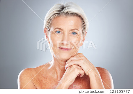 Skincare, senior woman and skincare, beauty and cosmetic wellness fro anti aging in grey studio background mockup. Elderly female model happy with skin health, face and healthcare with facial makeup 125105777
