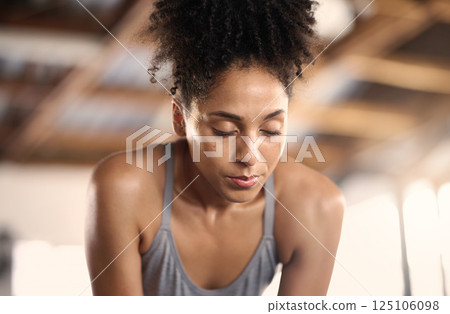 Tired gym black woman breathing, challenge and training fatigue, healthy risk or body struggle for sports exercise. Sweating female athlete face, break and rest at workout mindset, focus and breathe 125106098