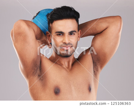 Fitness, sport and athlete man with muscle, energy and healthy lifestyle busy training, exercise and wellness workout for health. Portrait of India model with medicine ball for body care and strength Fitness, sport and athlete man with muscle, energy and healthy lifestyle busy training, exercise and wellness workout for health. Portrait of India model with medicine ball for body care and strength 125106363