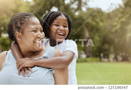 Black family, nature and child hug mother while relax in grass field park for bonding, mockup and quality time together. Love, youth child care and freedom for happy kid girl with mom, mama or parent 125106547