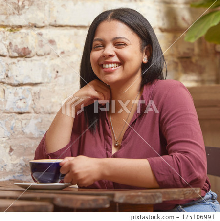Cafe, coffee or tea portrait of woman with real smile holding tea cup with happiness on drink break. Cafeteria, coffee shop or restaurant with natural, relaxed and happy latina girl customer. Cafe, coffee or tea portrait of woman with real smile holding tea cup with happiness on drink break. Cafeteria, coffee shop or restaurant with natural, relaxed and happy latina girl customer. 125106991