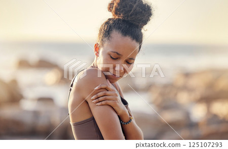 Fitness, black woman and arm pain from sports injury, exercise or training workout accident in the outdoors. African American female suffering from sore shoulder muscle, inflammation or tension Fitness, black woman and arm pain from sports injury, exercise or training workout accident in the outdoors. African American female suffering from sore shoulder muscle, inflammation or tension 125107293