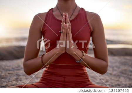 Hands, woman and yoga for meditation, zen balance and exercise with focus. Calm fitness girl with workout in Hawaii with mindfulness, body and wellness training at the ocean during sunset in summer Hands, woman and yoga for meditation, zen balance and exercise with focus. Calm fitness girl with workout in Hawaii with mindfulness, body and wellness training at the ocean during sunset in summer 125107465