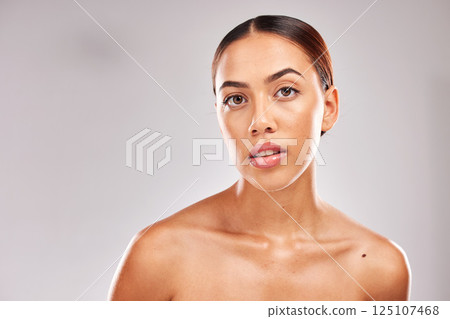 Woman, face glow and skincare on studio background in healthcare body wellness, dermatology cosmetology or self care. Portrait, beauty model and facial makeup cosmetics on mockup or mock up backdrop 125107468
