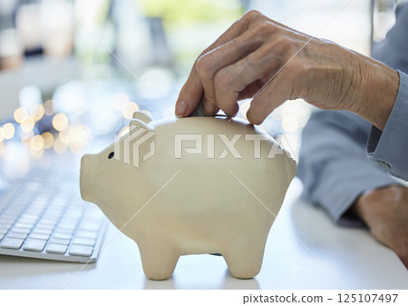 Money, hand and piggy bank in savings for finance, planning or investment growth at the office. Hands of business employee in financial investing strategy, banking and coin save for insurance plan Money, hand and piggy bank in savings for finance, planning or investment growth at the office. Hands of business employee in financial investing strategy, banking and coin save for insurance plan 125107497