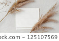 Mockup white blank space card, for Name place, Folded, greeting, invitation on wedding table setting background. with clipping path 125107569