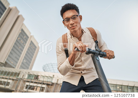 Scooter, city and portrait of a student man for travel and transportation with carbon footprint, eco friendly and urban lifestyle. Young gen z college or university person with an electric scooter Scooter, city and portrait of a student man for travel and transportation with carbon footprint, eco friendly and urban lifestyle. Young gen z college or university person with an electric scooter 125107738