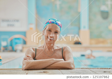 Swimming pool, fun and portrait of a senior woman doing water aerobics for exercise or workout. Happy, smile and elderly lady in retirement doing aquatic training lesson for skill, health or wellness 125107862