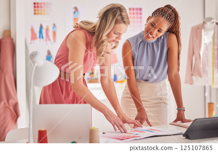 Fashion, design and team working, planning and creative thinking for range creation in their office, happy and content. Diversity, partnership and teamwork by women discuss, choose and fabric color 125107865