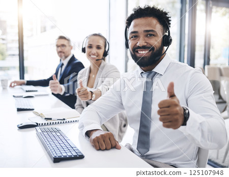 Thumbs up, call center staff and black man, success in the workplace, diversity and crm in customer service or telemarketing. Employee portrait, yes gesture and contact us, communication agreement. 125107948
