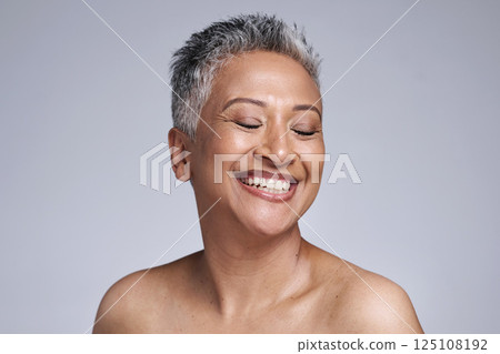 Happy senior model, beauty and makeup face for cosmetics, health and skincare by studio backdrop. Elderly black woman, skin wellness and radiant cosmetic glow, anti aging and smile by grey background Happy senior model, beauty and makeup face for cosmetics, health and skincare by studio backdrop. Elderly black woman, skin wellness and radiant cosmetic glow, anti aging and smile by grey background 125108192