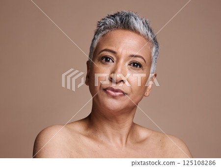 Senior woman, studio and beauty portrait for skincare, skin glow and natural makeup promotion, marketing or advertising mock up space. Old woman or elderly India model face shine for skin care facial Senior woman, studio and beauty portrait for skincare, skin glow and natural makeup promotion, marketing or advertising mock up space. Old woman or elderly India model face shine for skin care facial 125108286